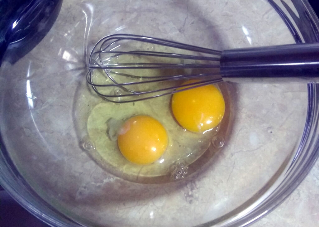 Batir 2 huevos